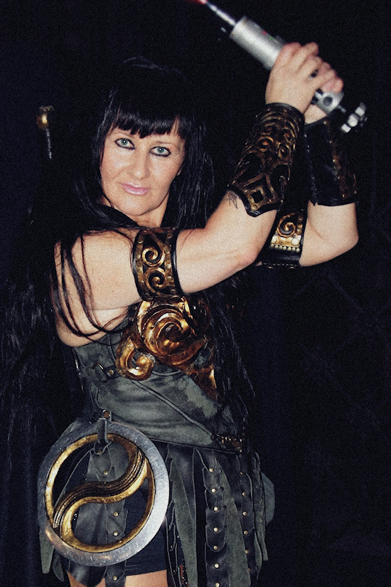 Xena Zellich as Xena with a light saber