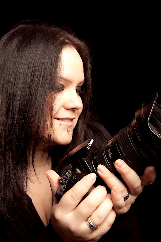 Ancalime: Self-Portrait holding Canon DSLR Camera