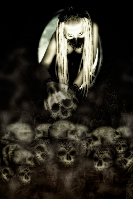 Ancalime Gothic Fantasy Photo: Model Mjumju Mau Mau above a pile of skulls