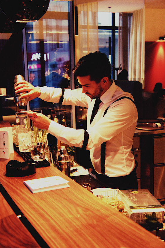 Waiter preparing Gin Basil Cocktail @ Joma Bar Wien