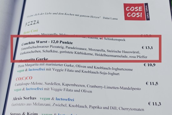 Conchita Wurst pizza in the menu of Cose Cosi in Linz, Austria.