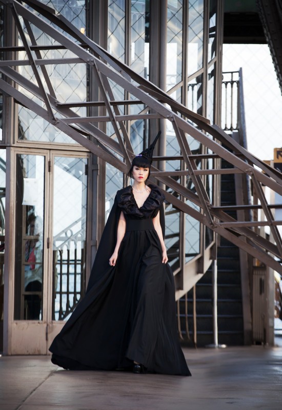 Jessica Minh Anh in a couture dress by Debaj on the Eiffel Tower.