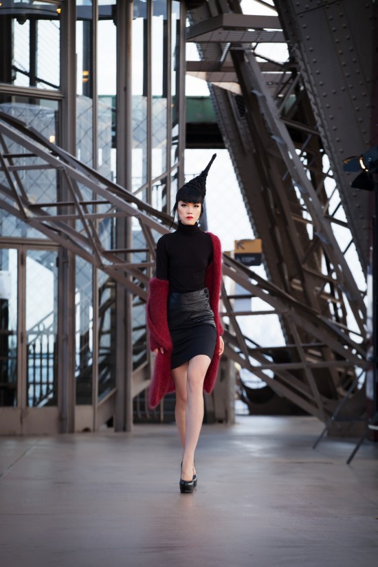 Jessica Minh Anh in a couture dress by Soul Made Faroe Islands on the Eiffel Tower.